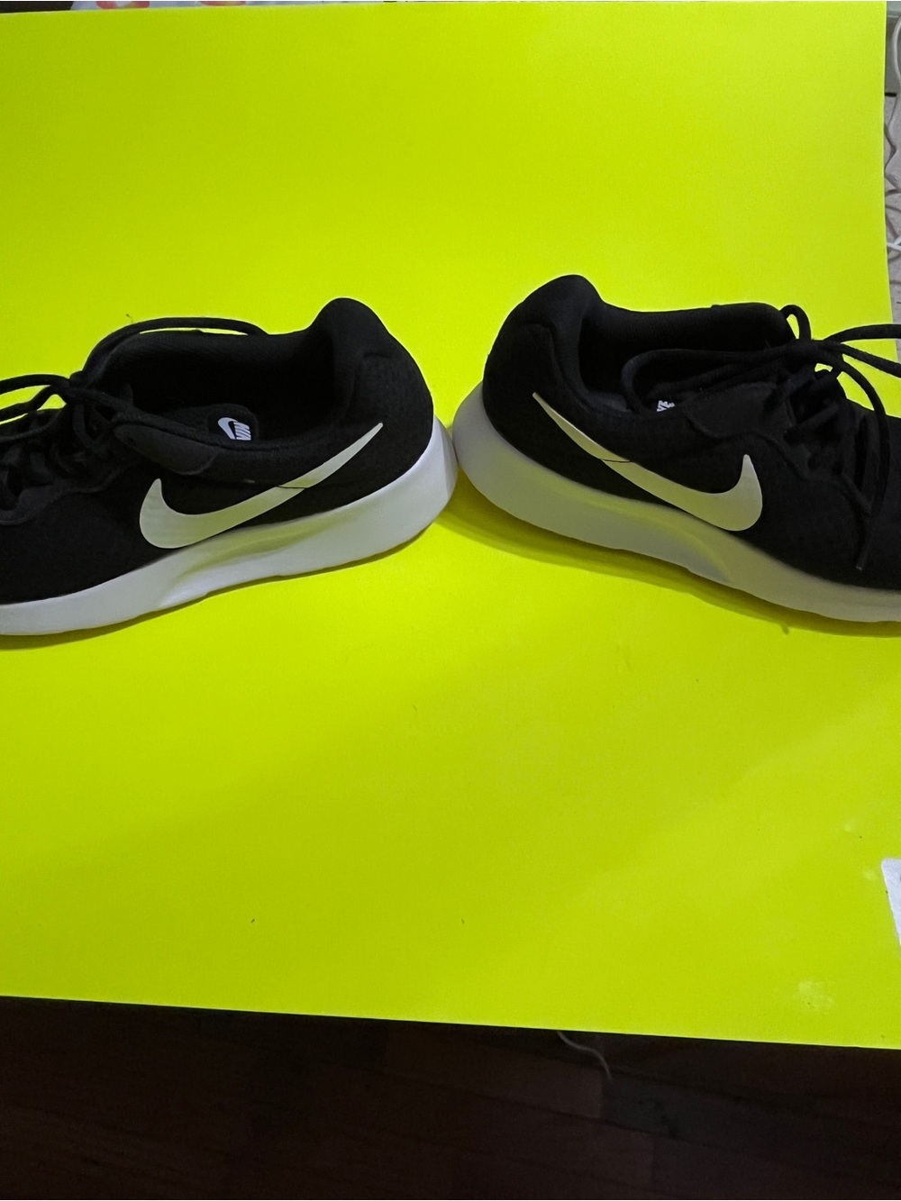 Nike Black Sneakers with White Swoosh